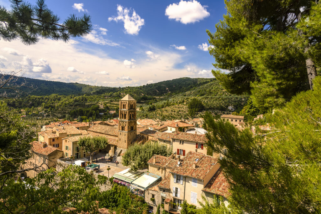 The village of Moustiers-Sainte-Marie overlooking the Valensole Plateau in Provence, France